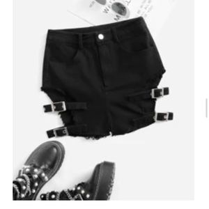 Black shorts with buckles